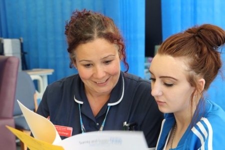 nurse and young female patient.jpeg